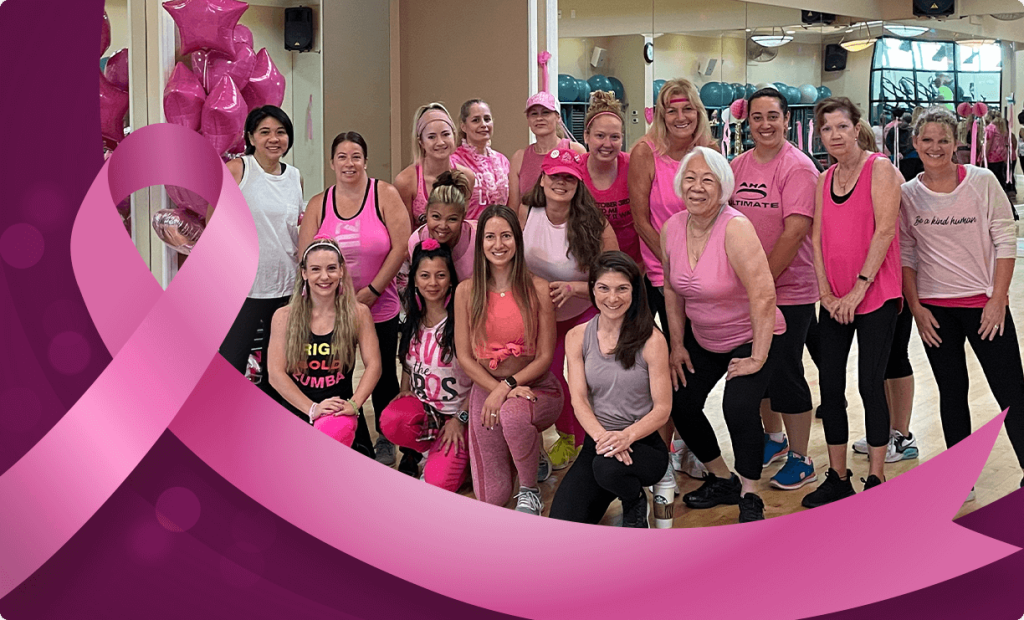 Vision sports club members celebrating breast cancer awareness week and wearing pink to show support and raise awareness for this common form of cancer in women.