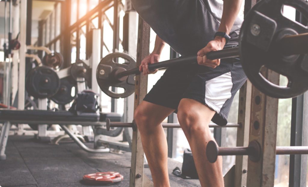 Man lifting barbells