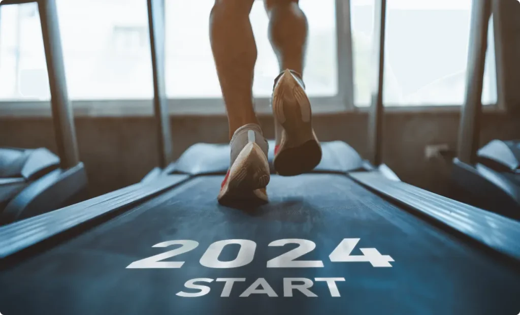A sportsman running on treadmill symbolizing the start of 2024