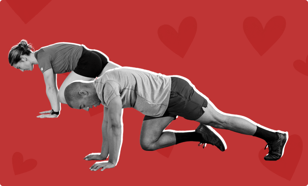A couple doing Partner Mountain Climbers side by side at Vision Sports Club.