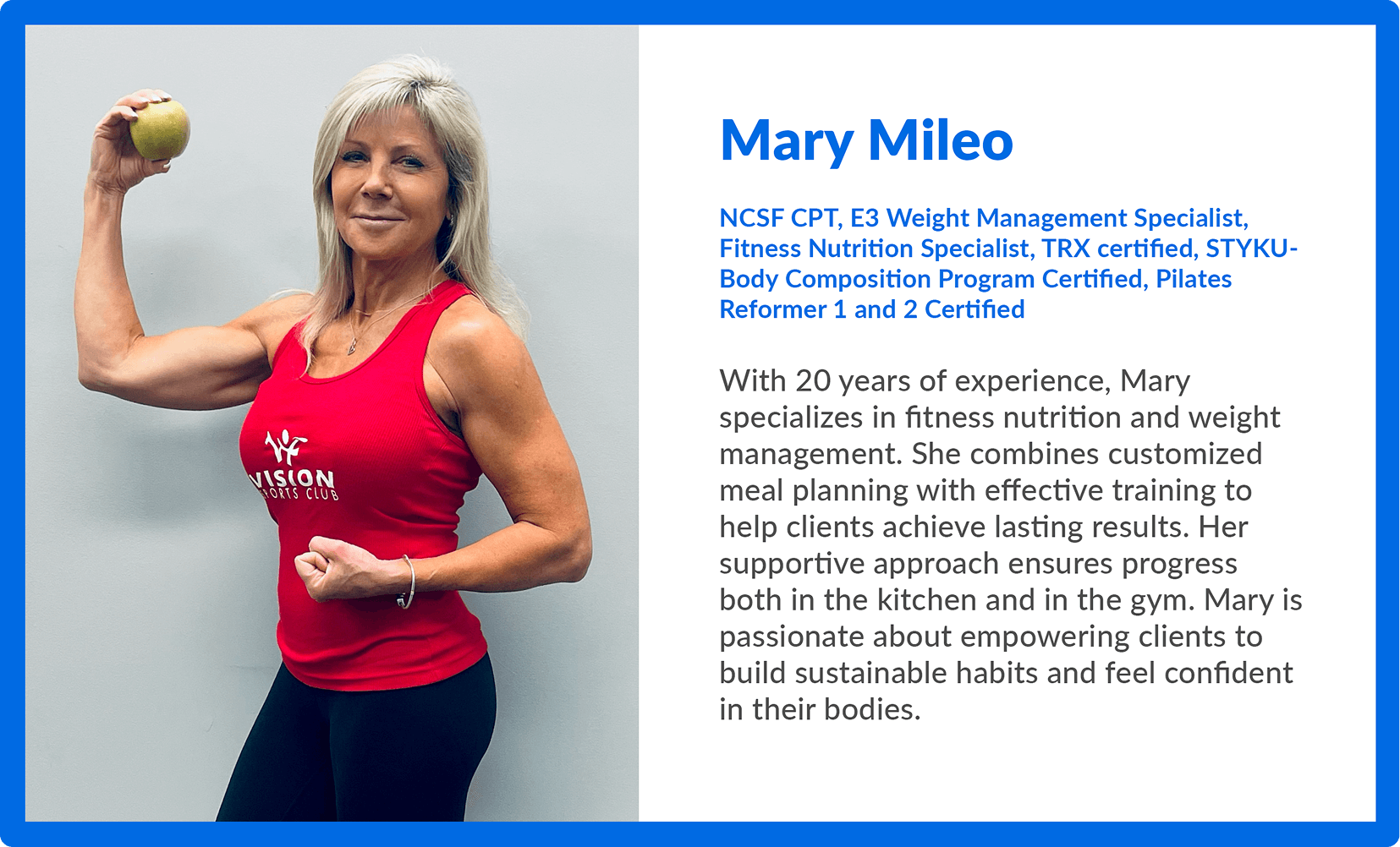 Mary Mileo, fitness nutrition and weight management specialist at Vision Elite, holding an apple while wearing a red Vision Elite training top.