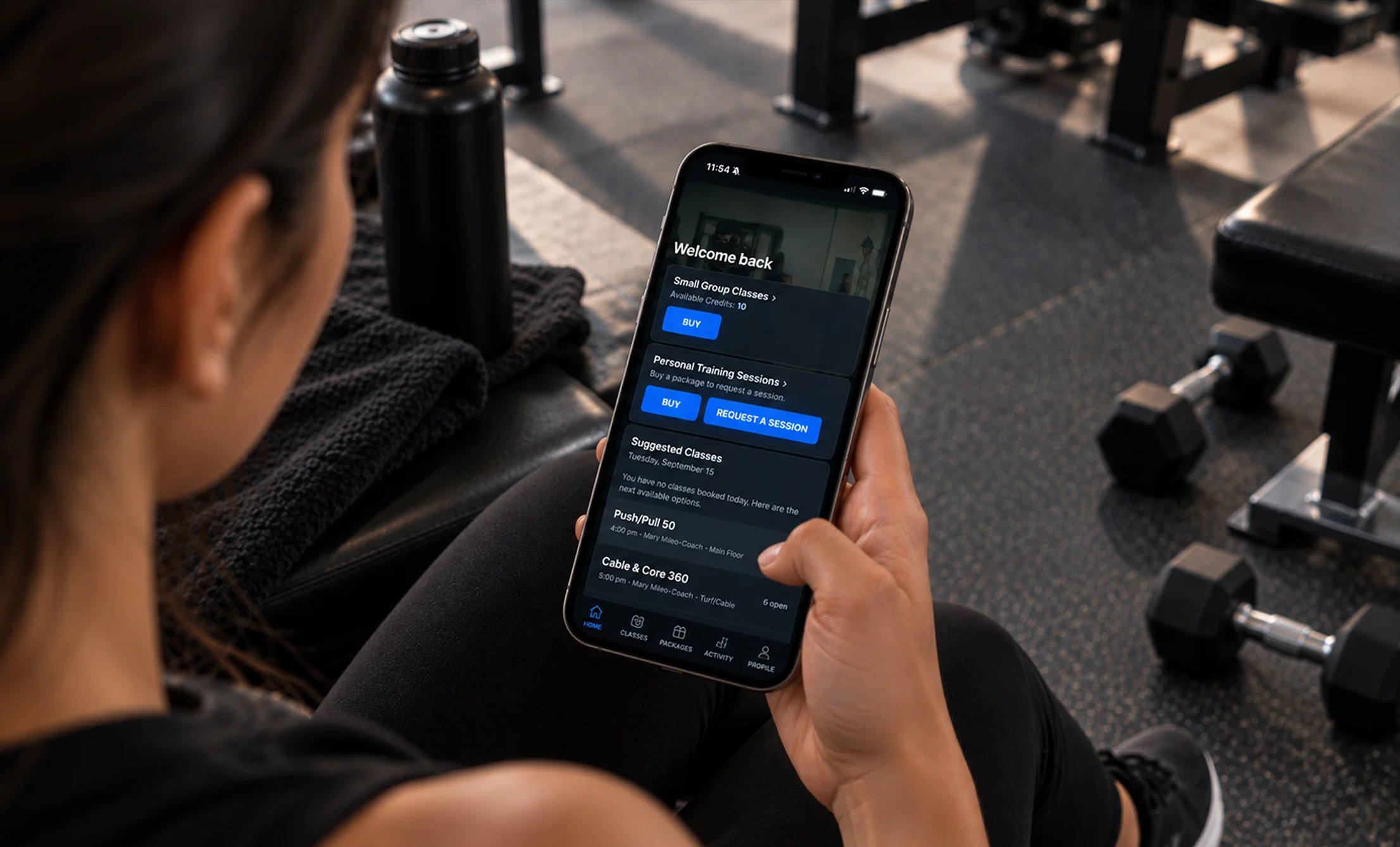 Vision Elite Training App showing suggested fitness classes and booking options